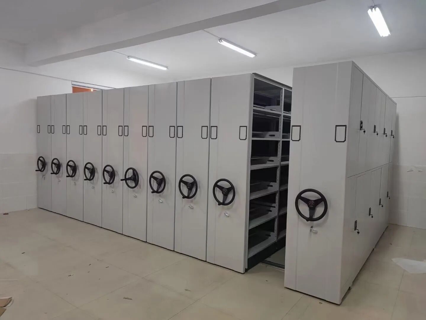 Mobile vs. Static Shelving for Archives: Storage Capacity and Total Cost Comparison
