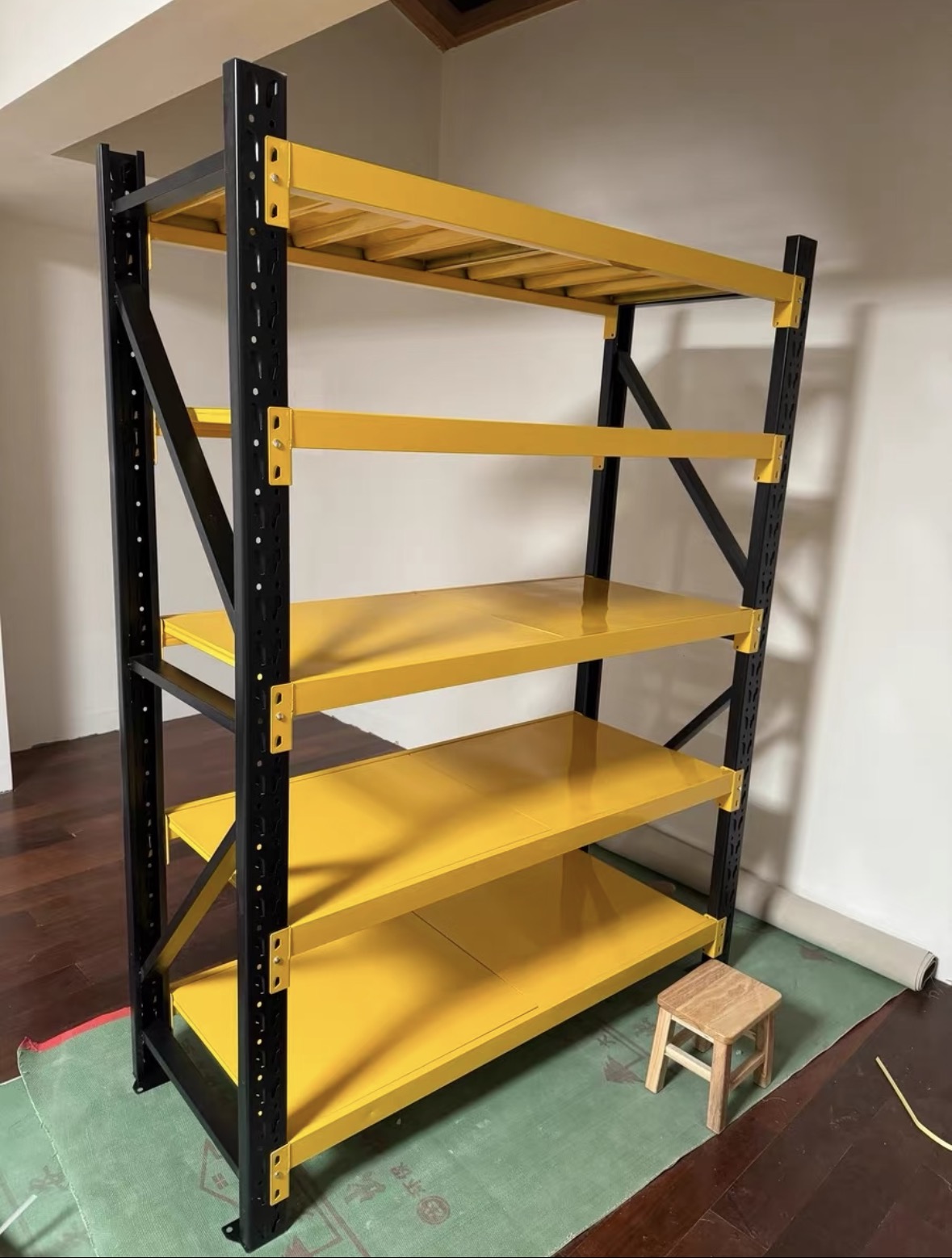 Black and yellow heavy-duty adjustable steel shelving for garage workshop and warehouse storage (1) Black and yellow heavy-duty adjustable steel shelving for garage workshop and warehouse storage (1)